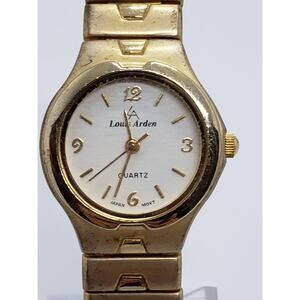 Louis Arden dress watch, Small round face, gold accents. Working watch